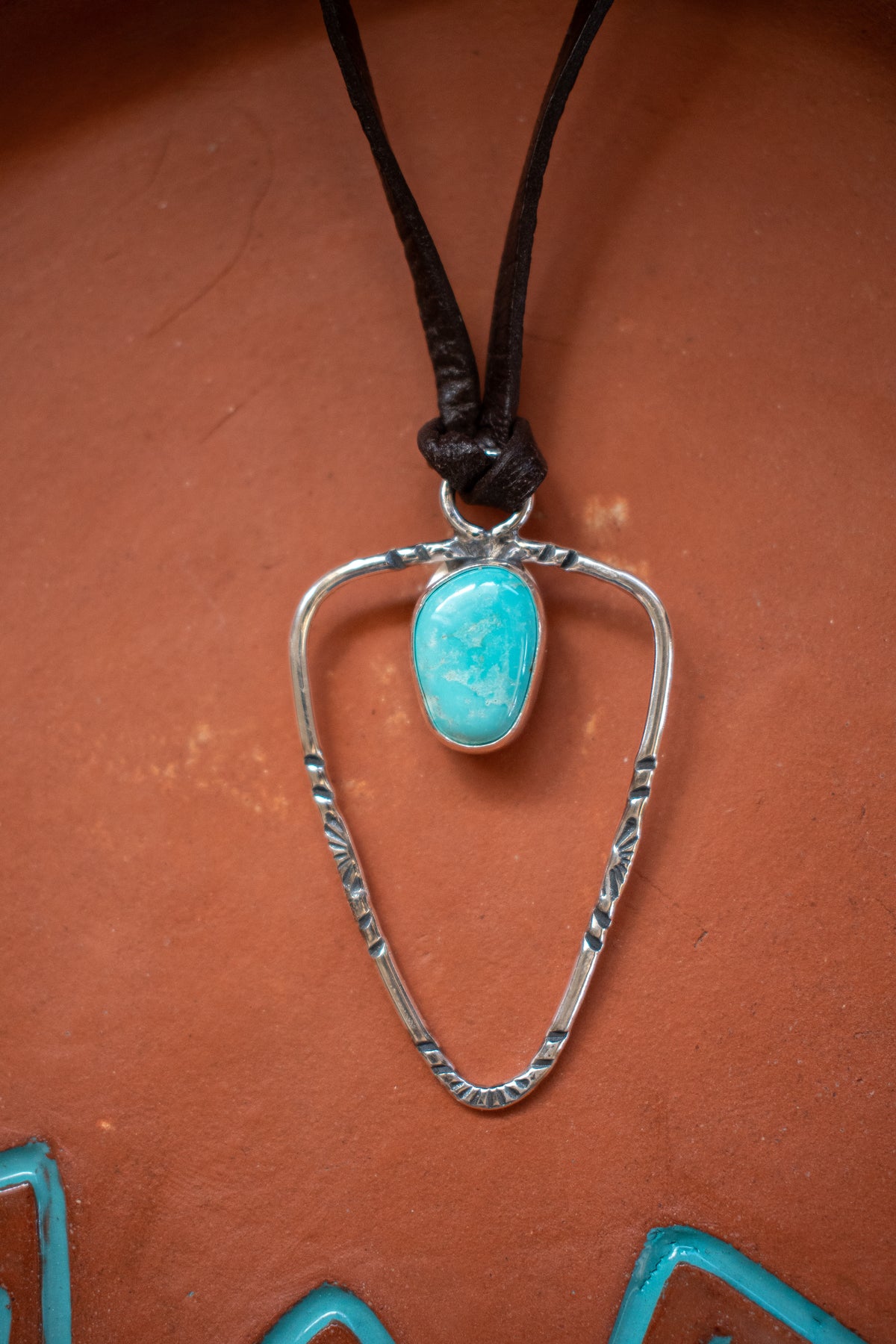 Lone Mountain turquoise arrowhead pendant